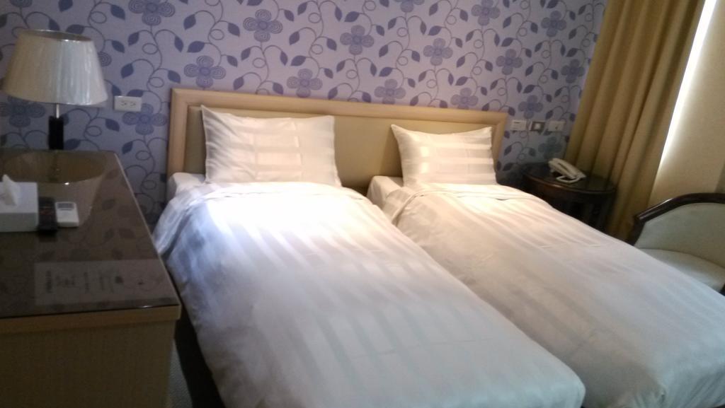 A Casa Hotel Taoyuan Quarto foto