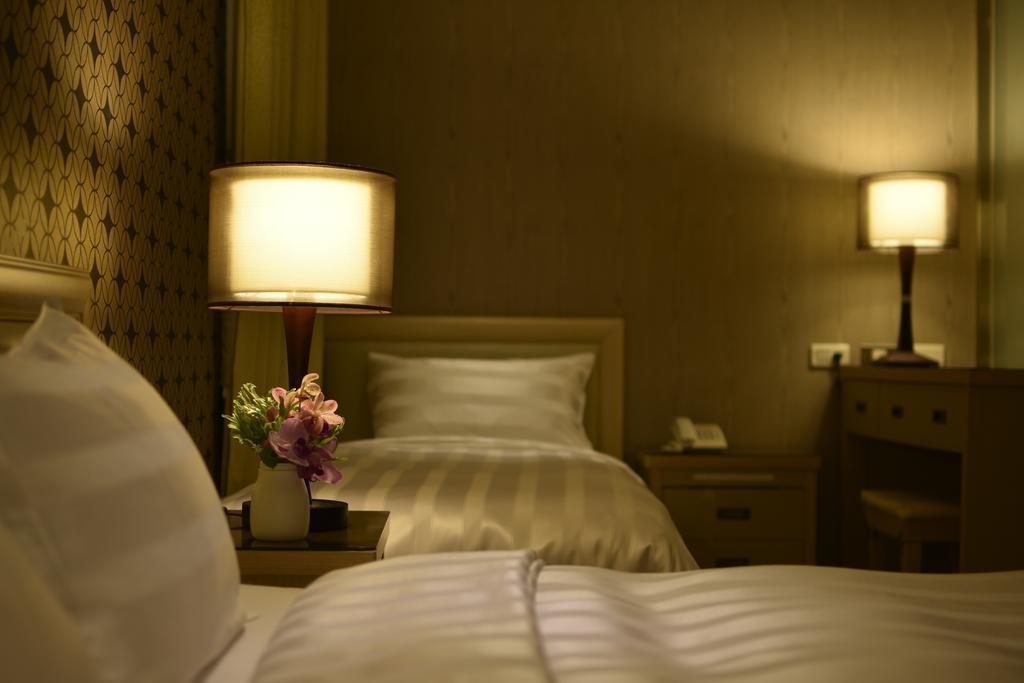 A Casa Hotel Taoyuan Quarto foto