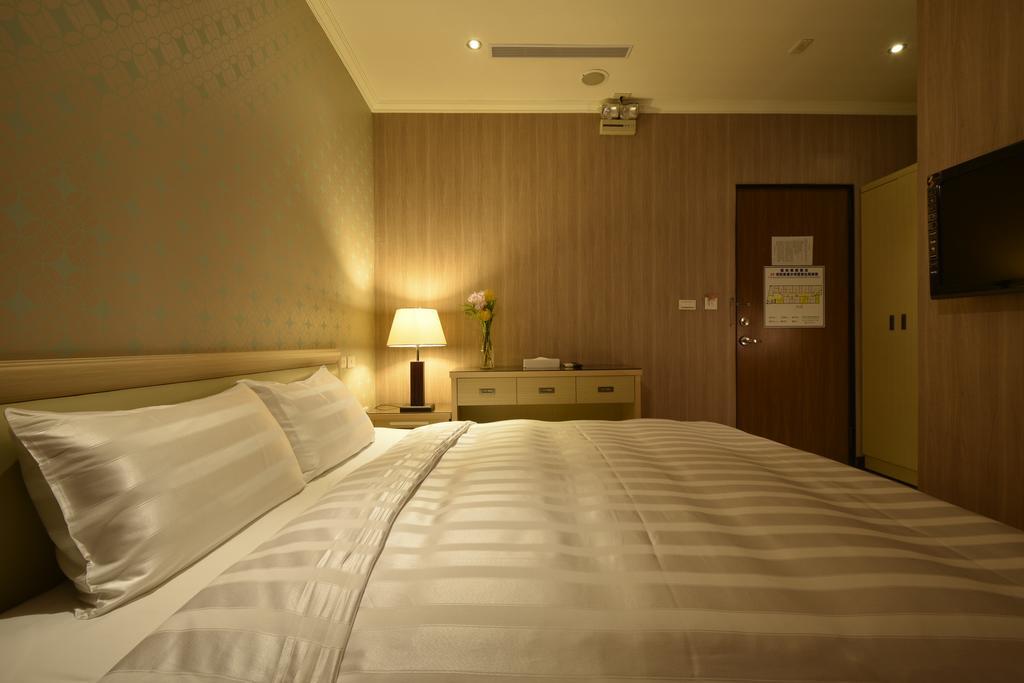 A Casa Hotel Taoyuan Quarto foto