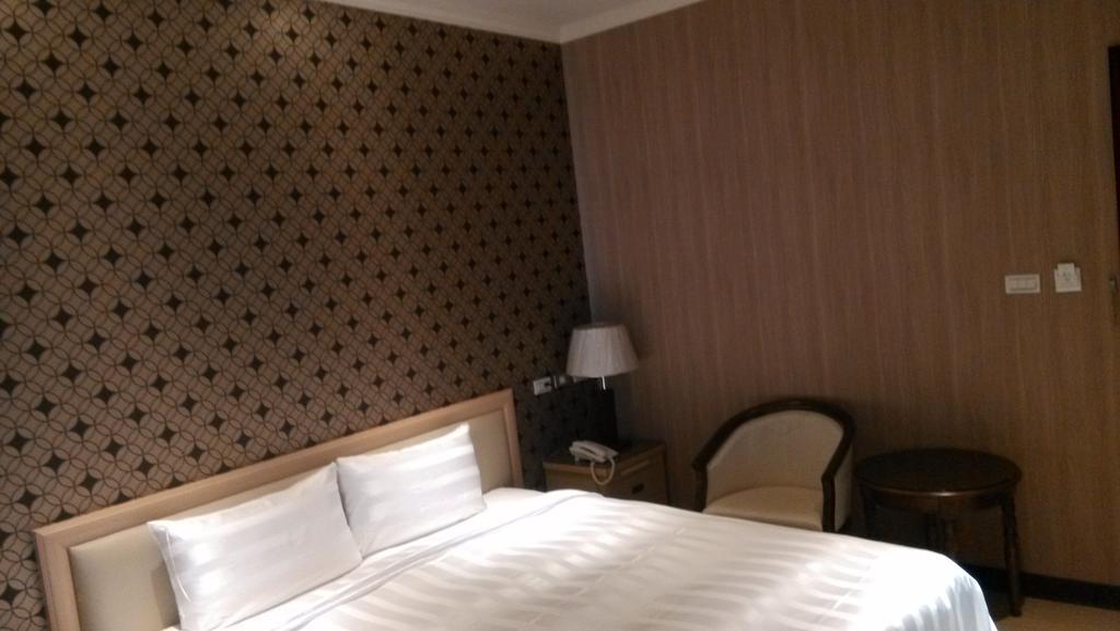 A Casa Hotel Taoyuan Quarto foto