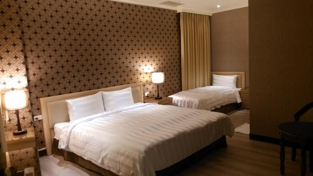 A Casa Hotel Taoyuan Quarto foto